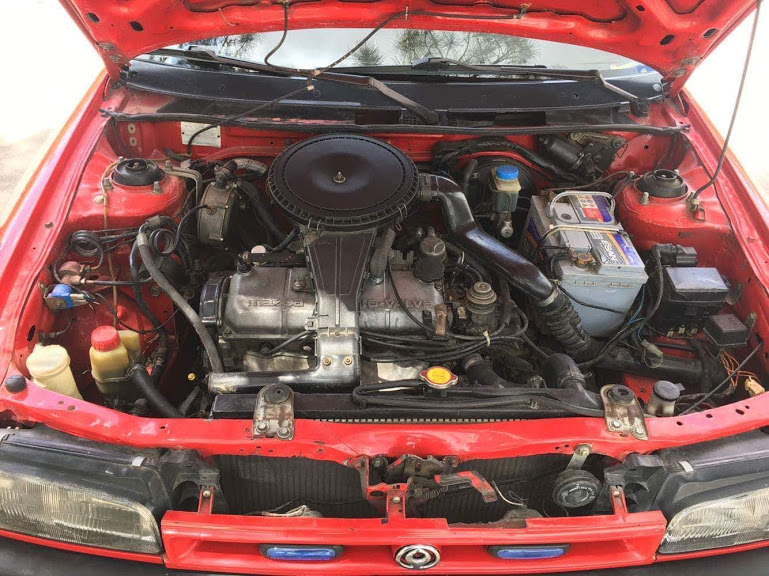 Mazda 323 b6 motor resmi Mazda 323 Neden Çok Tercih Edilmekte